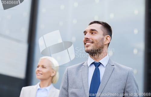 Image of close up of smiling businessmen