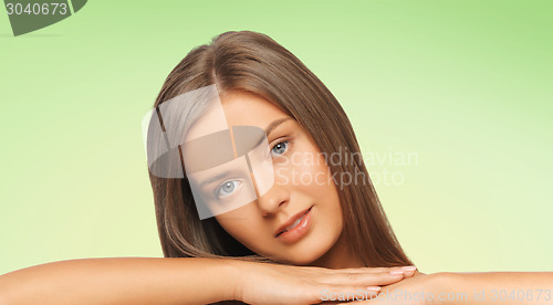 Image of beautiful young woman with bare shoulders