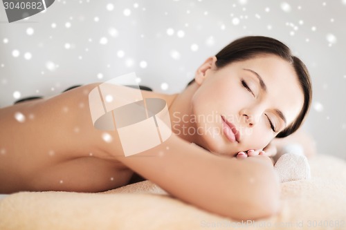 Image of beautiful young woman in spa