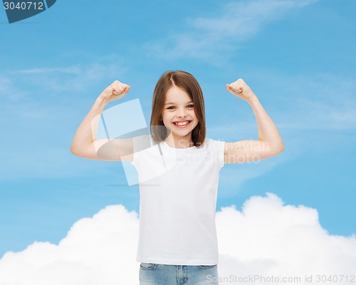 Image of smiling little girl in white blank t-shirt