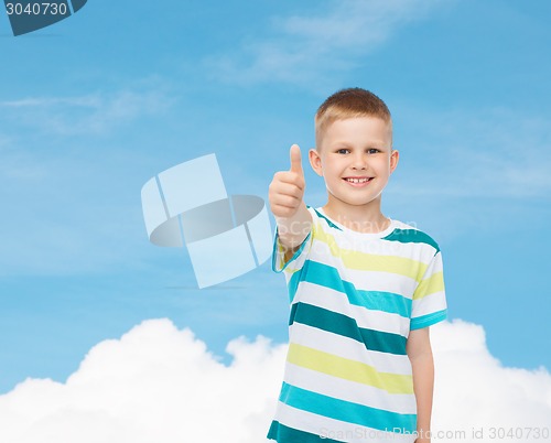 Image of little boy in casual clothes with arms crossed