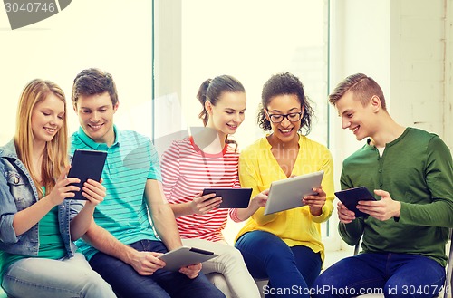 Image of smiling students with tablet pc computer