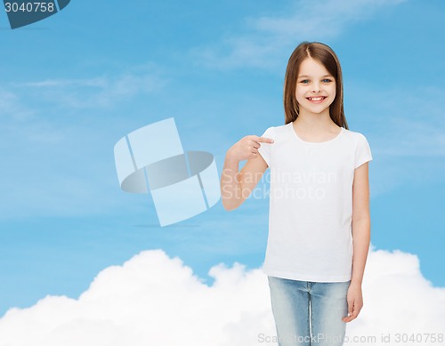 Image of smiling little girl in white blank t-shirt