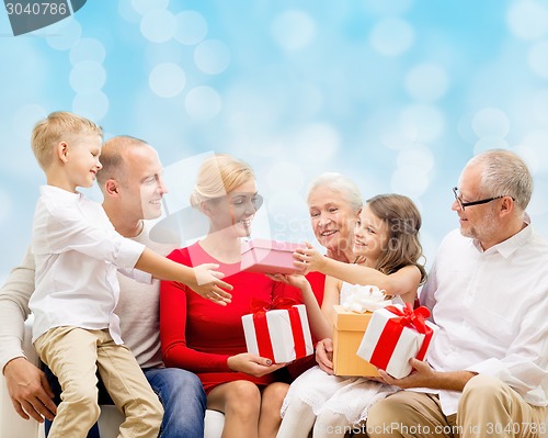 Image of smiling family with gifts