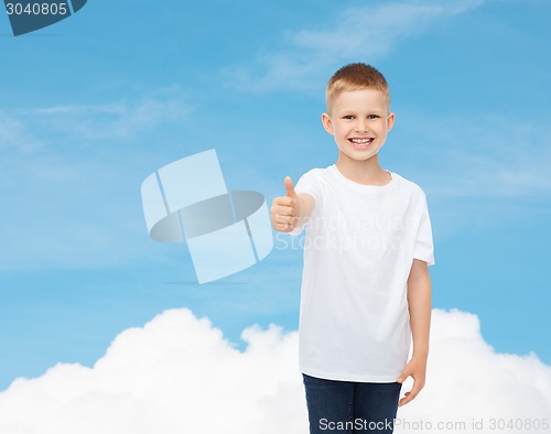 Image of smiling little boy in white blank t-shirt