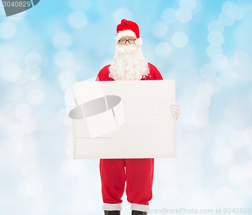 Image of man in costume of santa claus with billboard