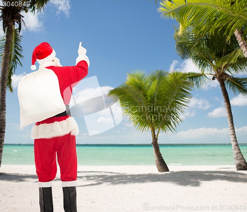 Image of man in costume of santa claus with bag