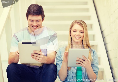 Image of smiling students with tablet pc computer