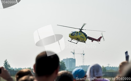 Image of People waiting of landing Eurocopter