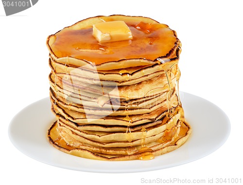 Image of Pancakes with butter and syrup.