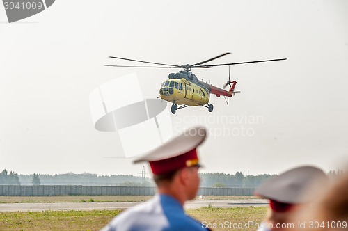 Image of Passenger helicopter MI-8 landing