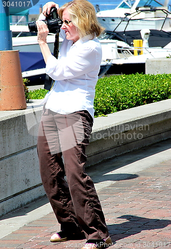 Image of Female photographer.