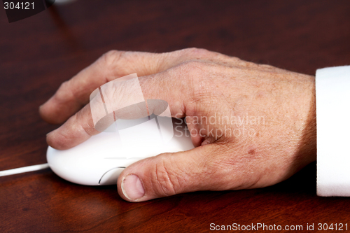 Image of senior's hand on mouse