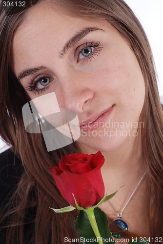 Image of woman and rose on white