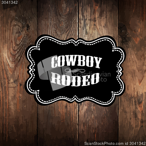 Image of Wooden background with wild west styled label