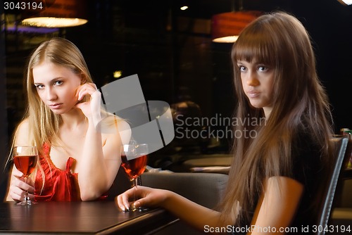 Image of Attractive girl relax with wine