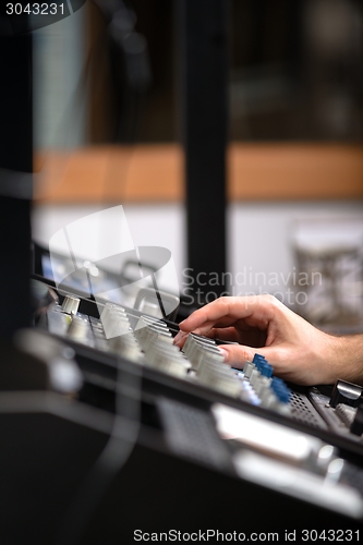 Image of Closeup photo of an audio mixer