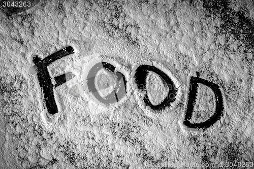 Image of White flour on black background