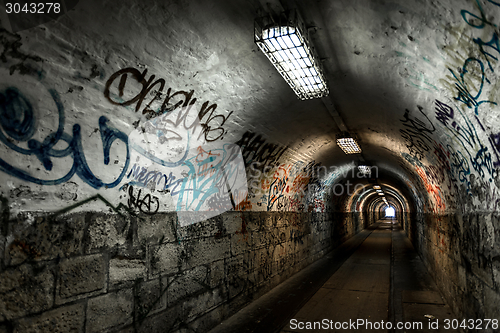 Image of Dark undergorund passage with light