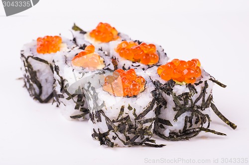 Image of sushi roll in nori with caviar 