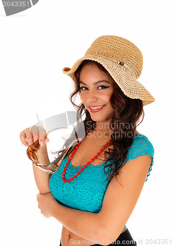 Image of Pretty girl with straw hat.