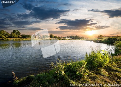 Image of Blue river under clouds