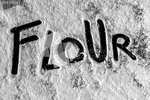 Image of White flour on black background