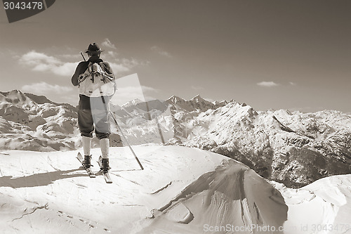 Image of Sepia Vintage skier with wooden skis