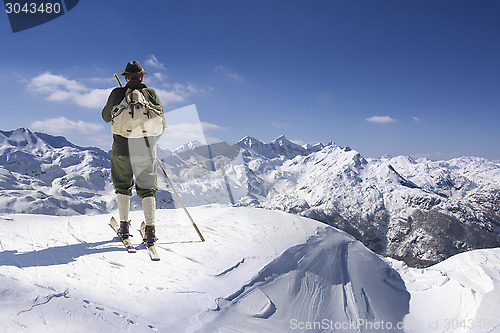 Image of Vintage skier with wooden skis