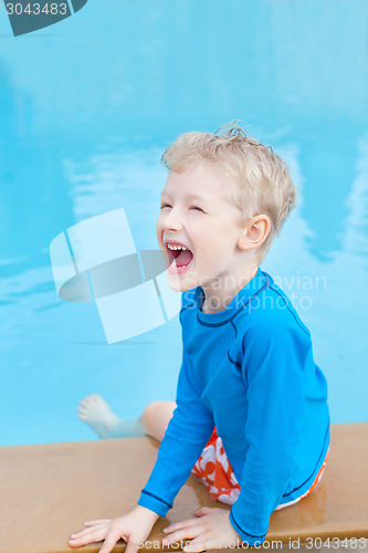 Image of kid by the pool