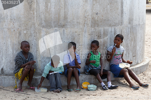 Image of Happy Namibian school children waiting for a lesson.