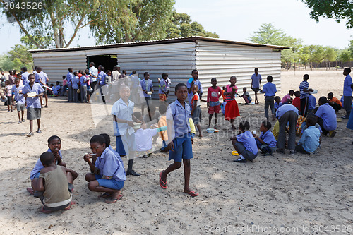 Image of Happy Namibian school children waiting for a lesson.