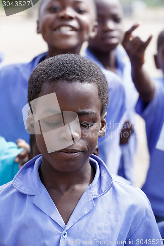 Image of Happy Namibian school children waiting for a lesson.