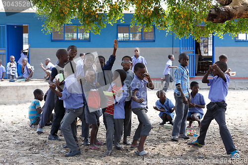 Image of Happy Namibian school children waiting for a lesson.