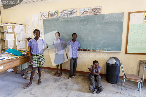 Image of Happy Namibian school children waiting for a lesson.