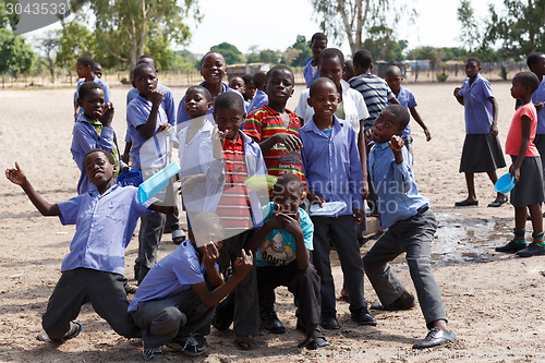 Image of Happy Namibian school children waiting for a lesson.