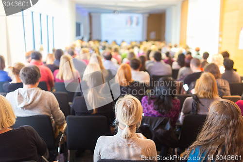 Image of Speaker at Business Conference and Presentation.