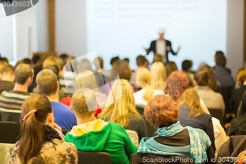 Image of Speaker at Business Conference and Presentation.