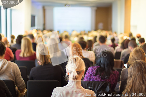 Image of Speaker at Business Conference and Presentation.