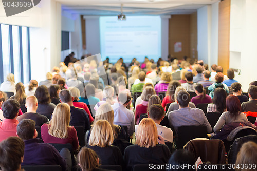 Image of Speaker at Business Conference and Presentation.