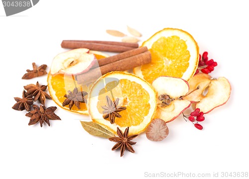 Image of Christmas spices and dried orange sliceson 