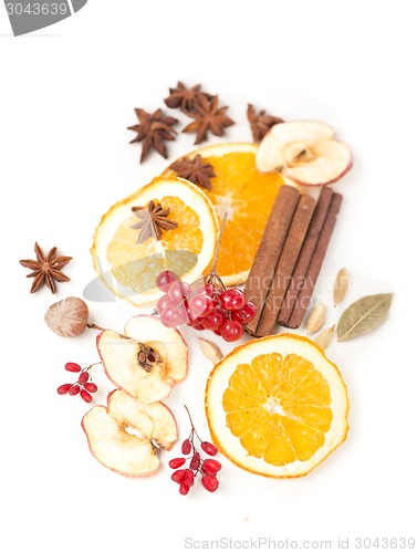 Image of Christmas spices and dried orange sliceson 