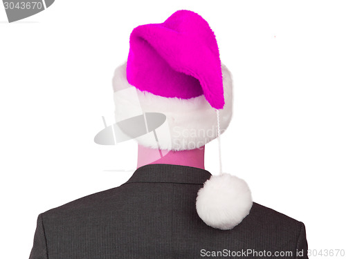 Image of Business man with a santa hat 