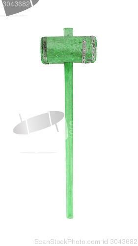 Image of Very old wooden hammer isolated, green