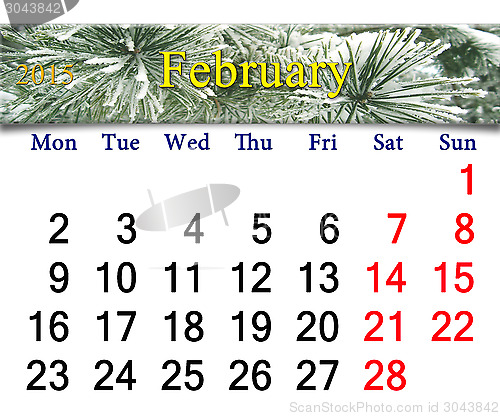 Image of calendar for February of 2015 with pine branches