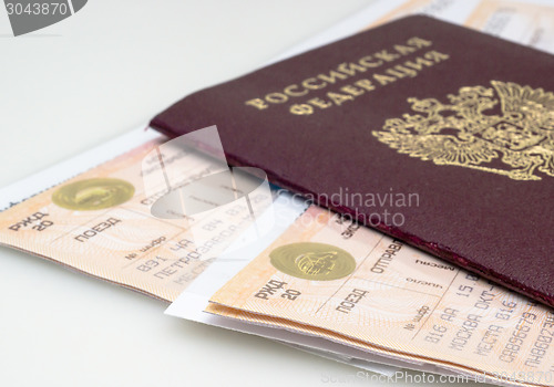 Image of Civil passport and train ticket