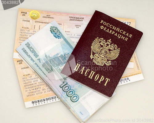 Image of Money, passport and train ticket 