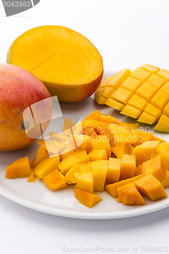 Image of Loose Cubes Of Mango Fruit Flesh And Scored Pulp