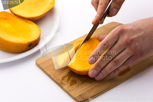 Image of Subdividing The Mango Thirds Into Fruit Chips