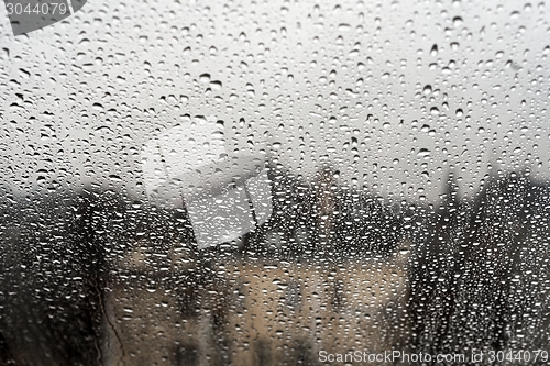 Image of Natural water drops on glass